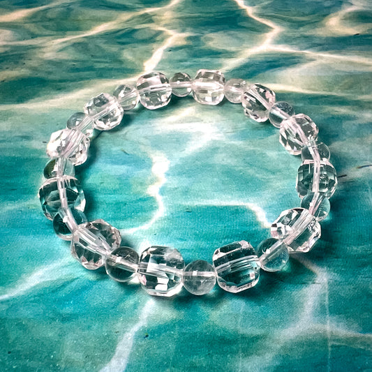 10MM FACETTED ALTERNATE FACETTED CUBE CLEAR QUARTZ BRACELET