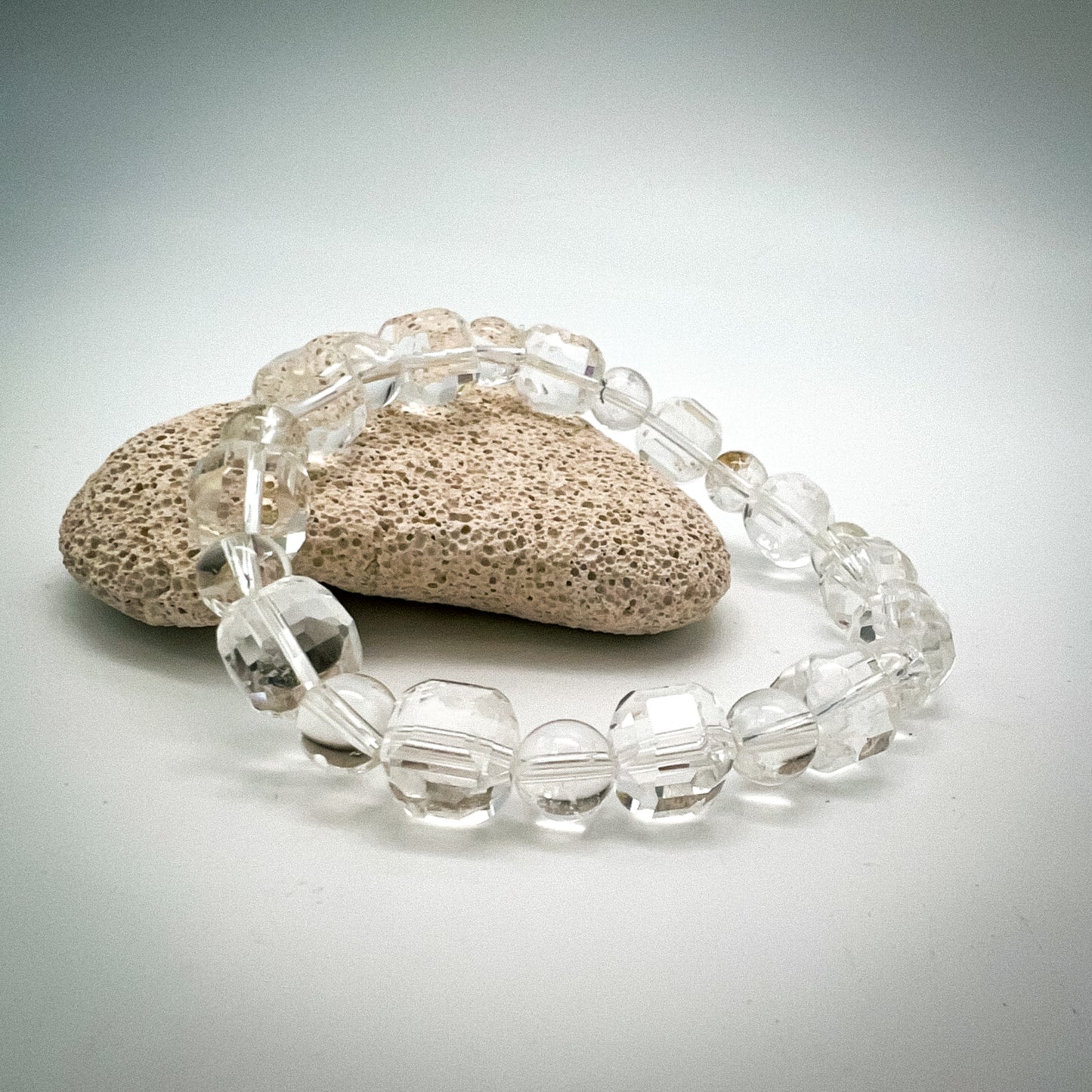 10MM FACETTED ALTERNATE FACETTED CUBE CLEAR QUARTZ BRACELET