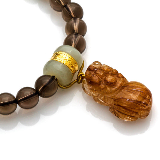 SMOKEY QUARTZ, JADE BEAD, GOLD RUTILATED PIYAO BRACELET