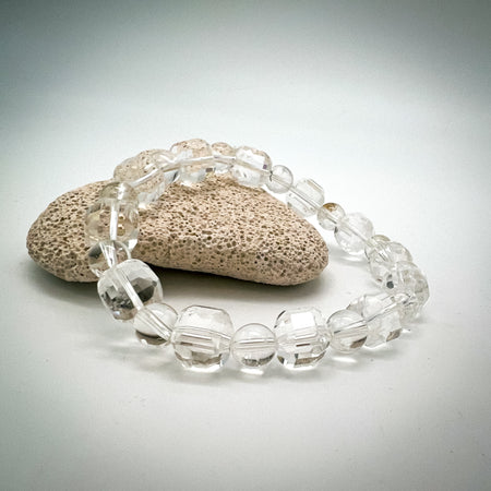 10MM FACETTED ALTERNATE FACETTED CUBE CLEAR QUARTZ BRACELET
