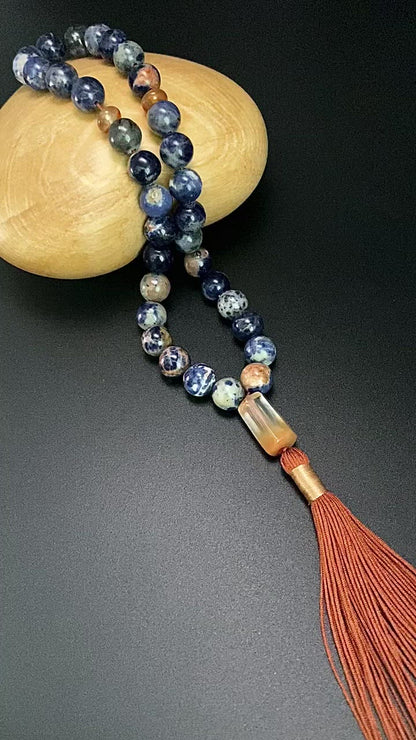 ORANGE SODALITE, RABBIT HAIR QUARTZ PRAYER BEADS