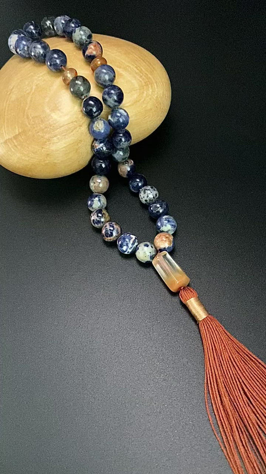 ORANGE SODALITE, RABBIT HAIR QUARTZ PRAYER BEADS