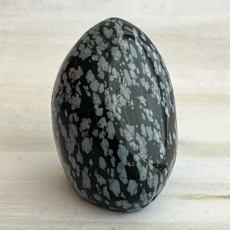 44 X 53 X 39 MM SNOWFLAKE OBSIDIAN HANDHELD TUMBLE